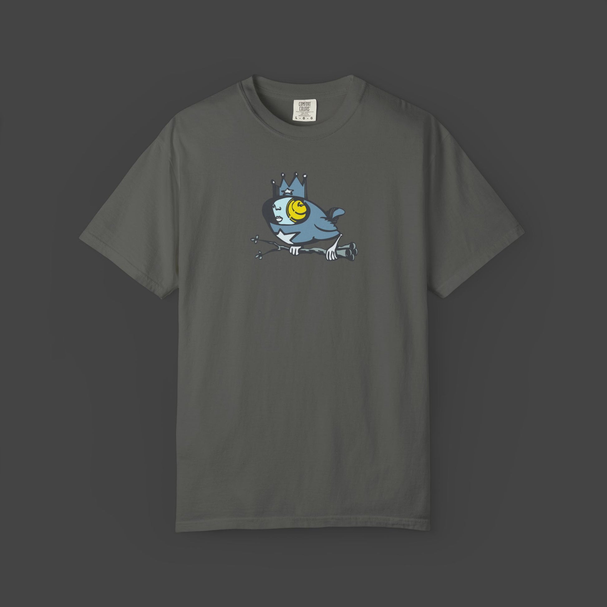“Biddy” a Surreal Bird Unisex T-shirt in grey by Jarrod Eastman features a quirky, artistic bird illustration on the chest. 