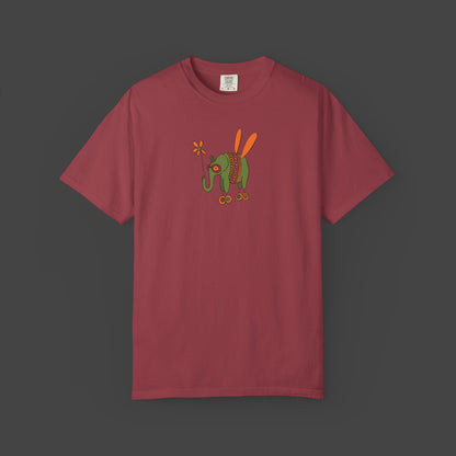 The Printify Flying Elephant Unisex T-shirt by Jarrod Eastman features an inspirational and fun maroon design with a colorful insect illustration on the chest.