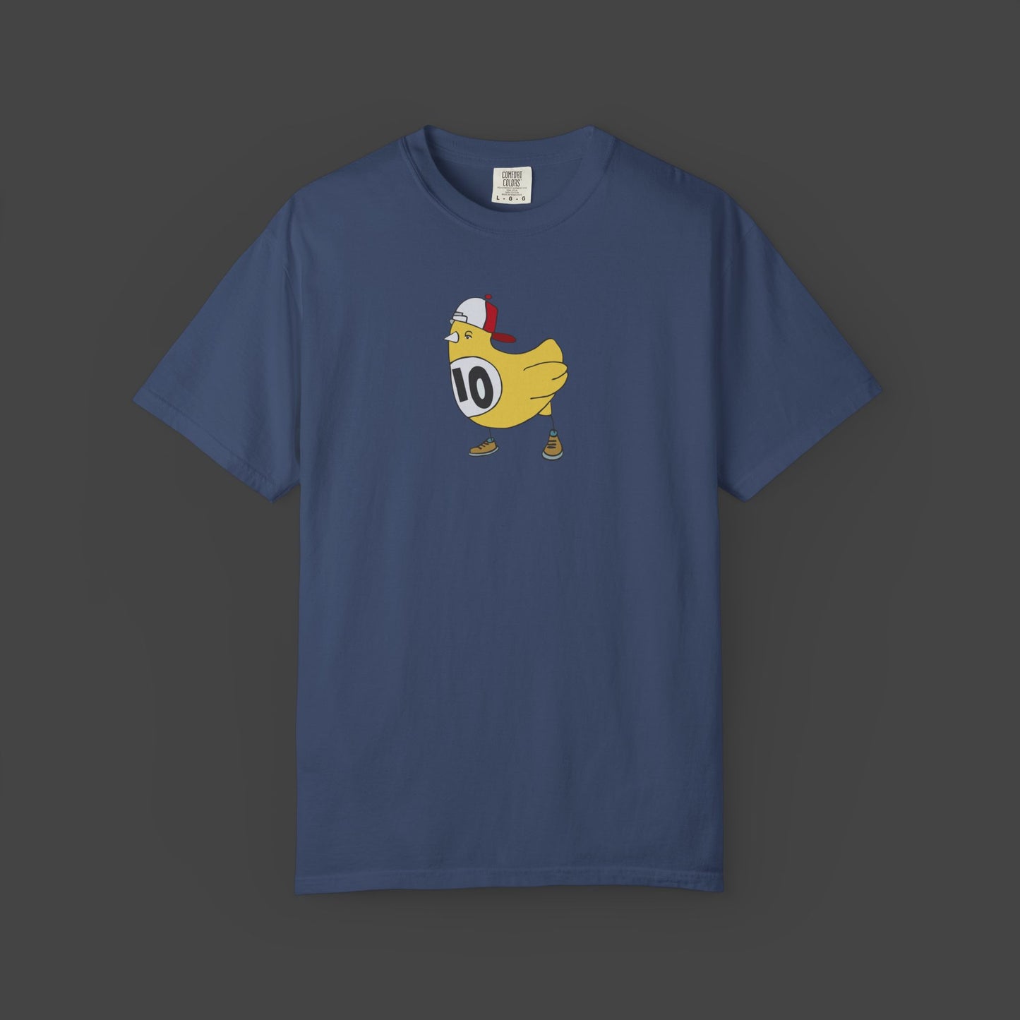 The Chicken Scratch Unisex T-shirt by Jarrod Eastman from Printify features a surreal cartoon yellow chicken in a red cap, sneakers, and race bib 10 on a dark gray tee—adding quirky art style to your wardrobe.