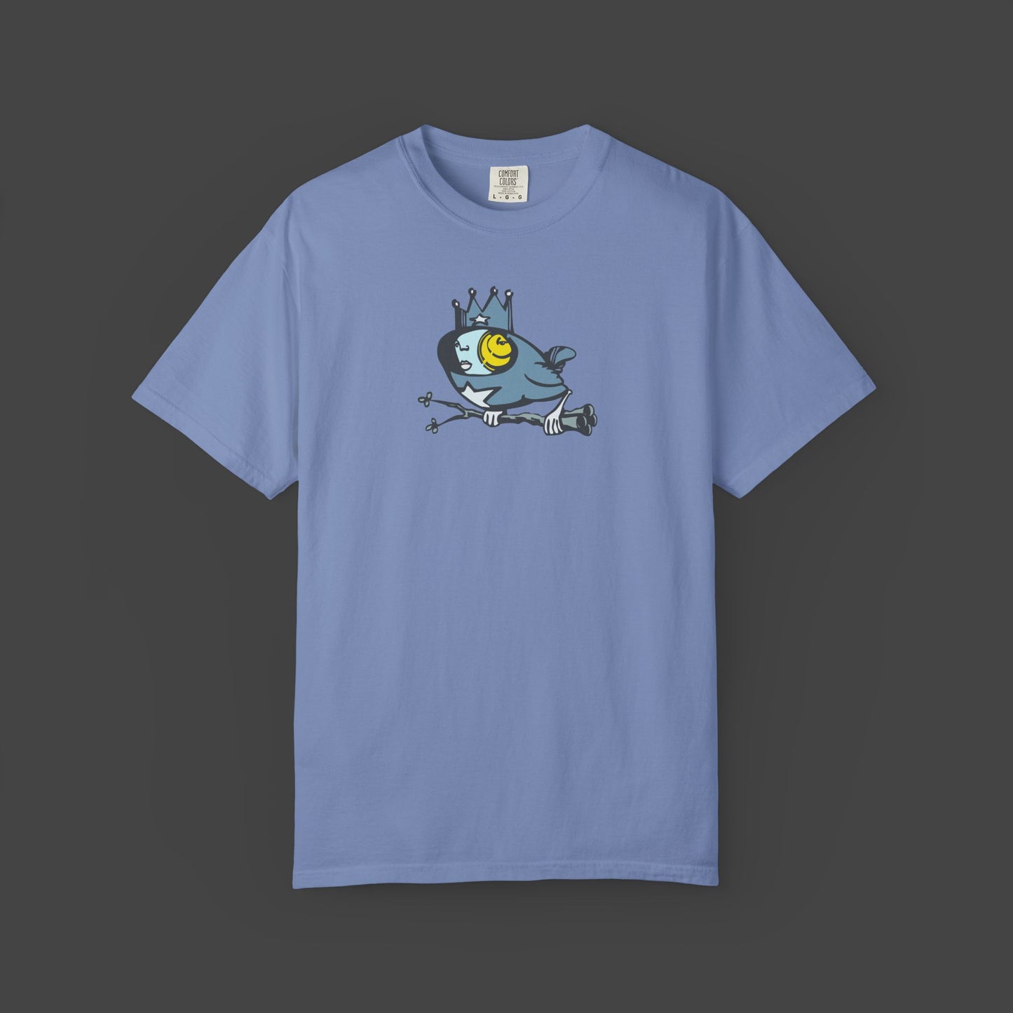 Biddy a Surreal Bird Unisex T-shirt in blue by Jarrod Eastman features quirky surreal bird art, centered on the chest, set against a dark gray background.