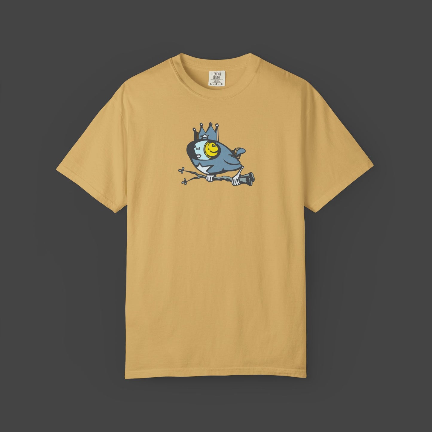 The Biddy Unisex yellow T-shirt by Jarrod Eastman. A whimsical blue bird with a human-like face, wearing a crown and holding a branch with its claws.