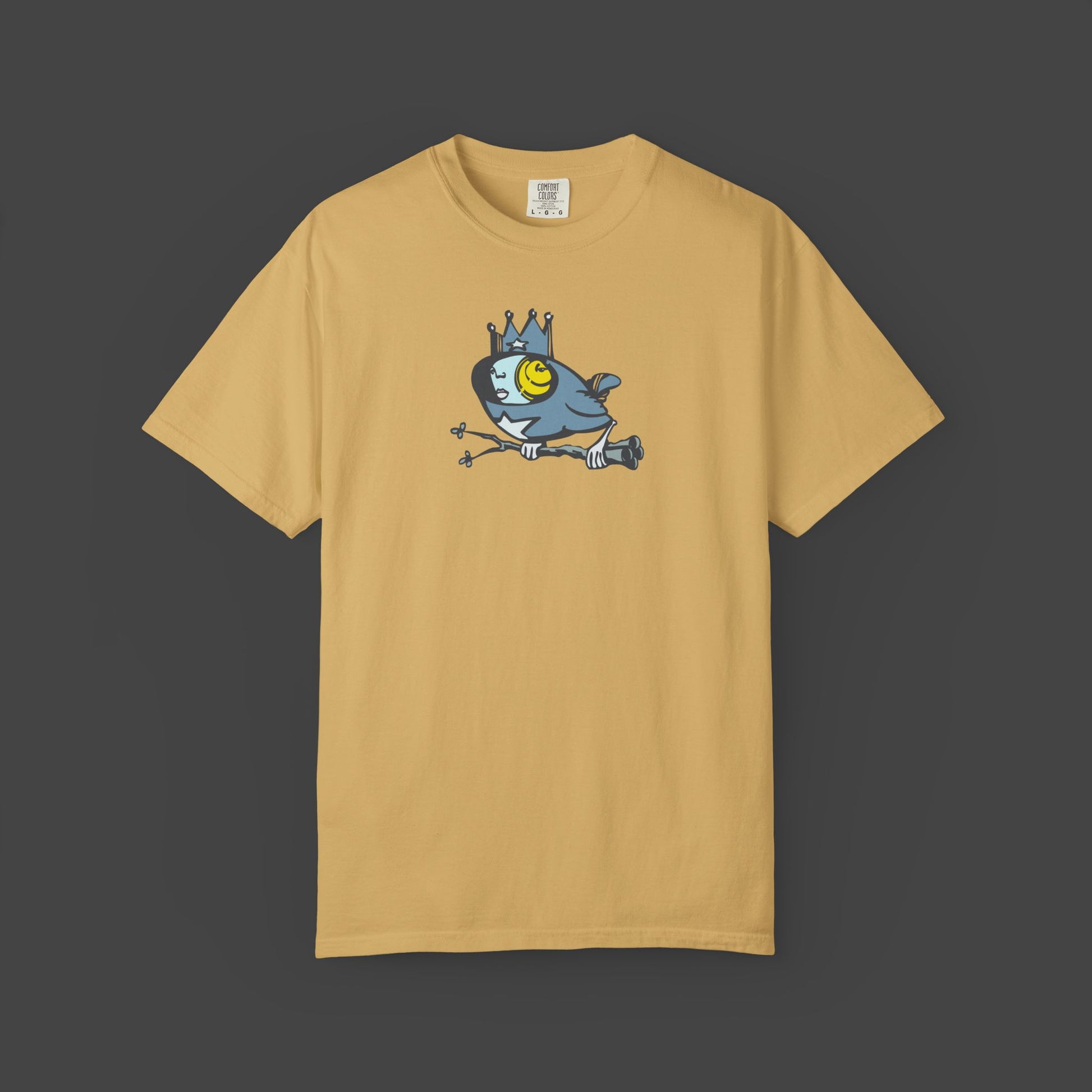The Biddy Unisex yellow T-shirt by Jarrod Eastman. A whimsical blue bird with a human-like face, wearing a crown and holding a branch with its claws.