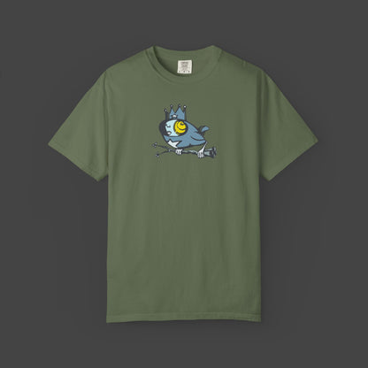 Biddy Surreal Bird Unisex T-shirt in green by Jarrod Eastman. A whimsical blue bird with a human-like face, wearing a crown and holding a branch with its claws.