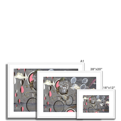 Beyond Ice Cream Island by Prodigi features three framed giclée prints on fine art paper, depicting whimsical art of a bearded man cycling among floating bubbles, clouds, and red-and-white teardrops on a gray background.