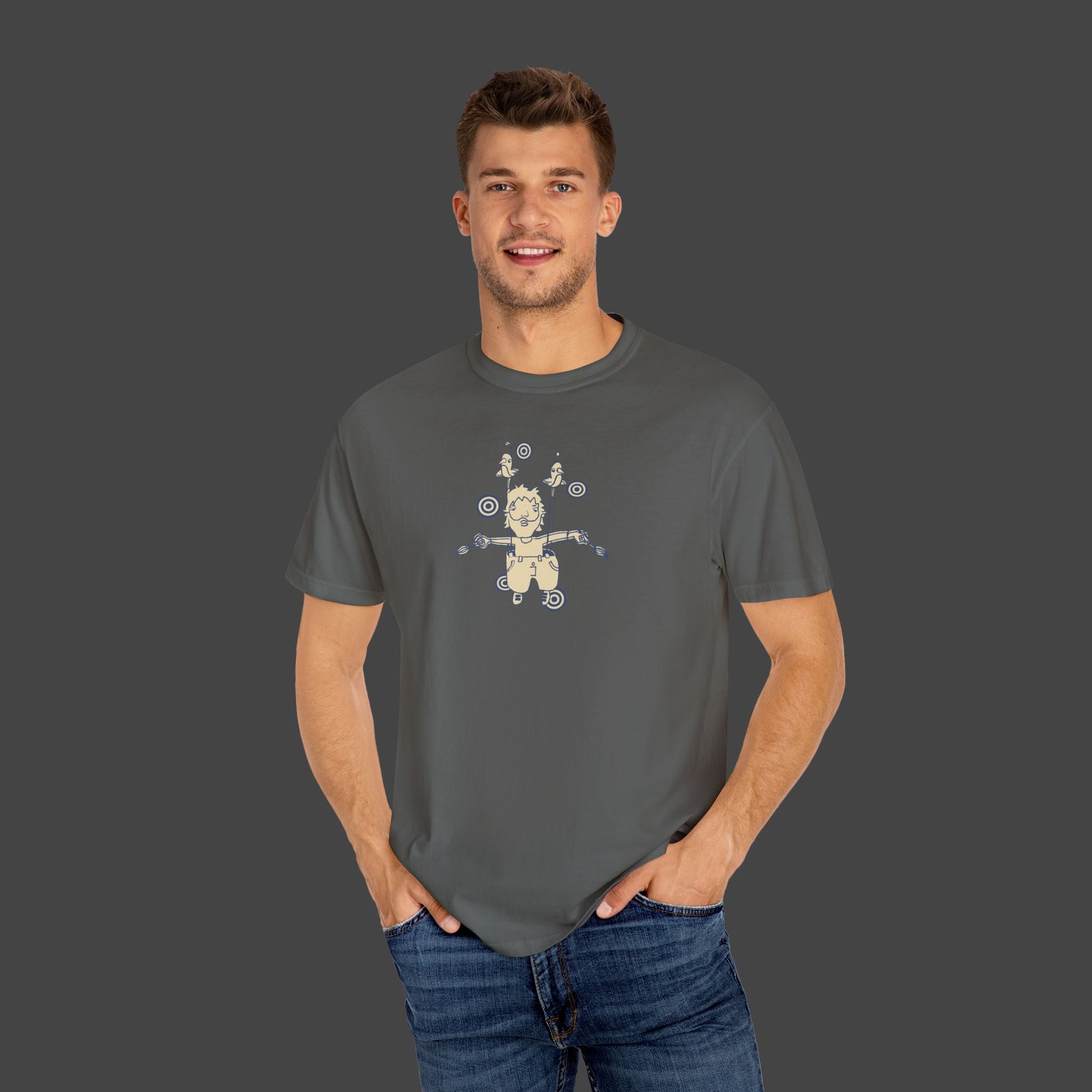 A man smiles with hands in pockets, wearing “The Day I Learned to Fly” unisex T-shirt by Jarrod Eastman