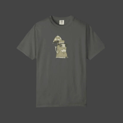 The Funky Monster T-shirt – Uptown Lester Design by Printify features a dark gray cartoon slug in a helmet and monocle, holding an ornate umbrella with a chain, capturing playful New Orleans monster vibes in a unique artistic style.